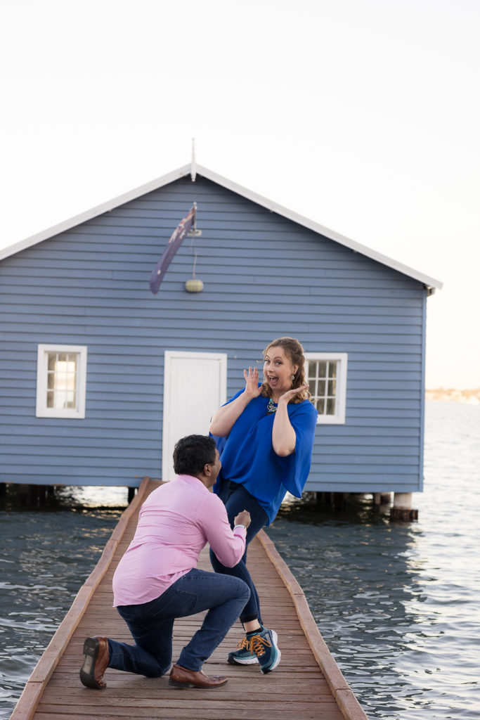 engagement photo blue boat shed