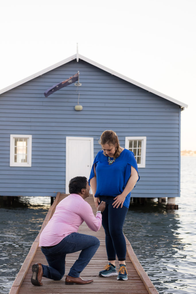 engagement photo blue boat shed