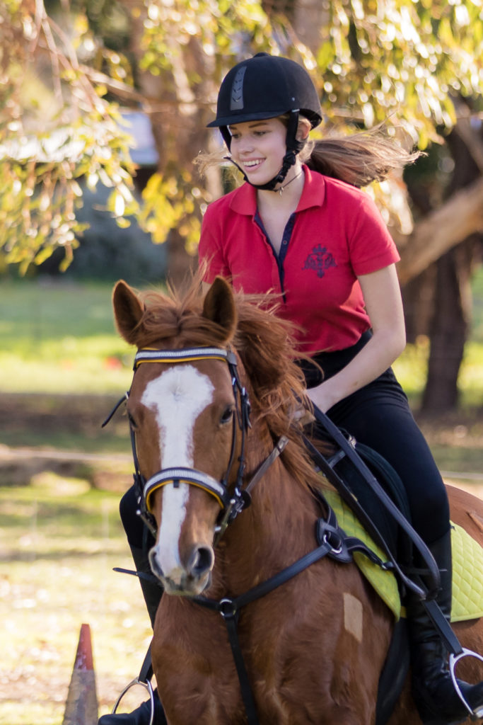 girl riding a horse