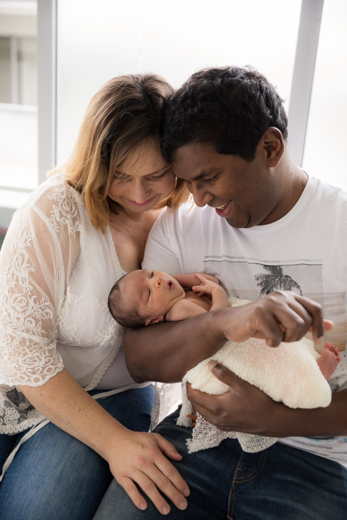 adoring parents and newborn photo