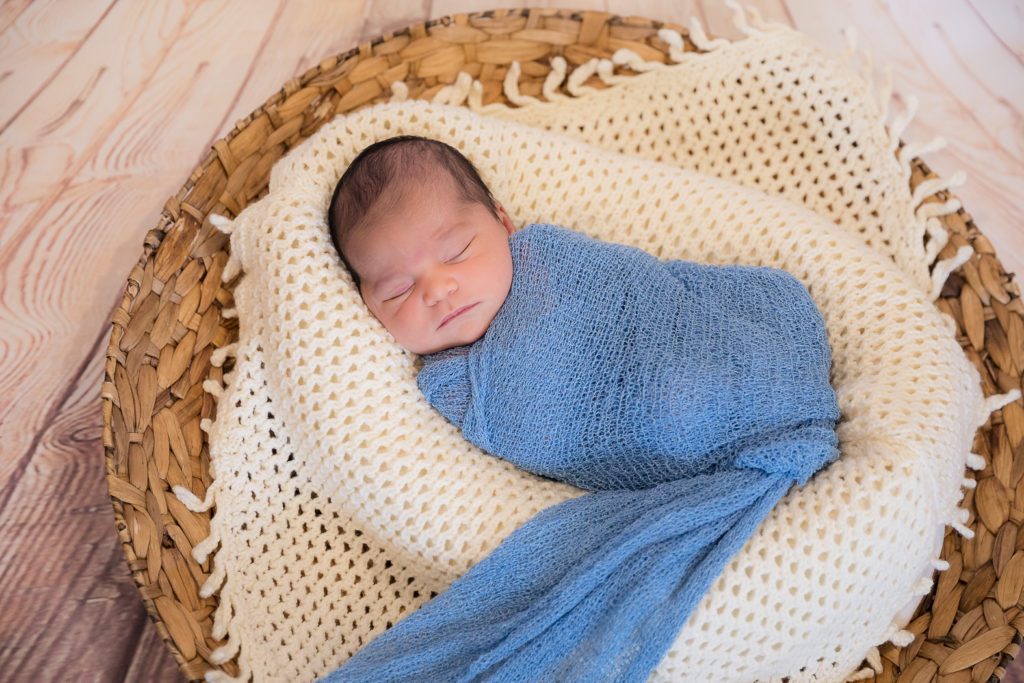 newborn baby in wrap